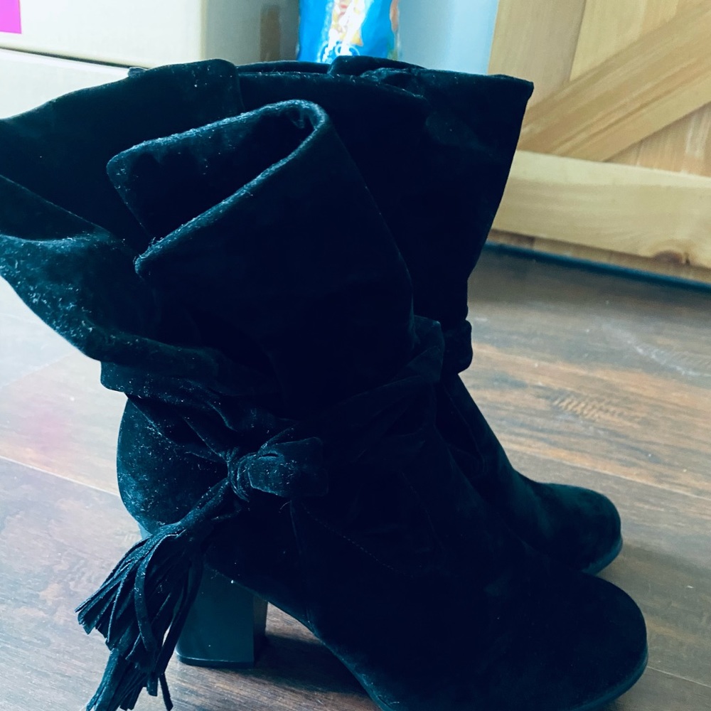 Chase and Chloe black suede booties with tassels.